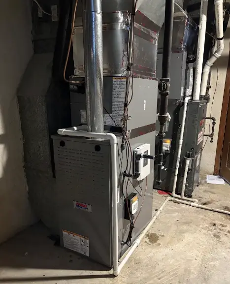 Residential furnace being serviced in Cincinnati, Ohio